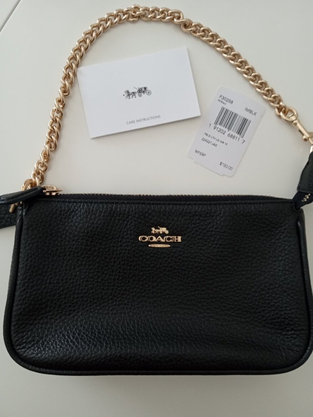 Coach mini pebbled leather handbag (Gold chain / Black leather)